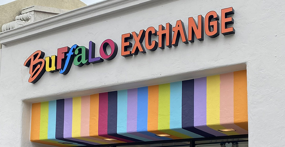 new-header Storefront of Buffalo Exchange Pasadena with Rainbow Lettering and Painted Stripes