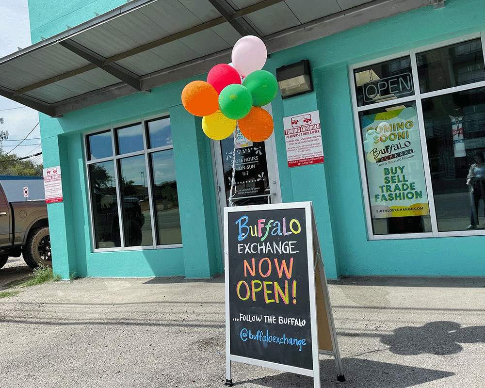 Buffalo Exchange Austin SoCo store front with sign that reads now open