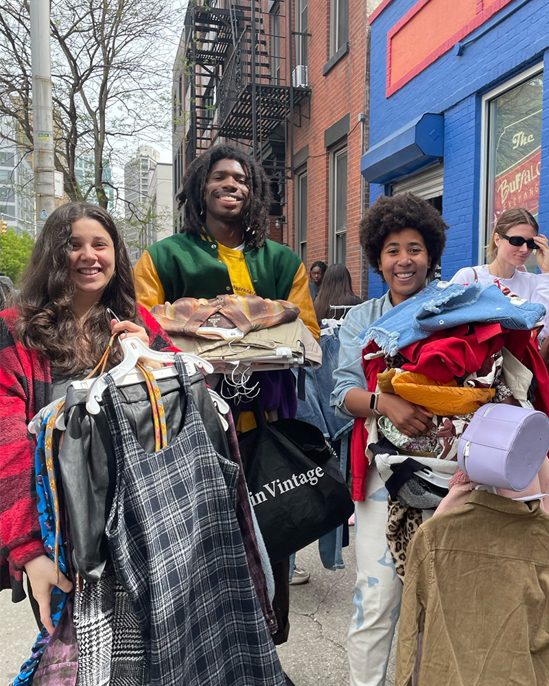 Three friends shopping the $1 sale