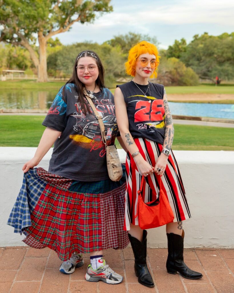 2024.04.12 GA (4) Two women wearing vintage racing tee shirts and skirts