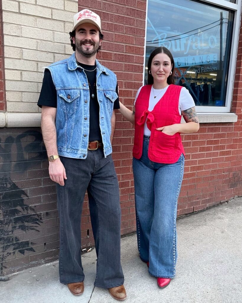 2024.05.29 TN1 (1) Two people wearing oversized vests and jeans