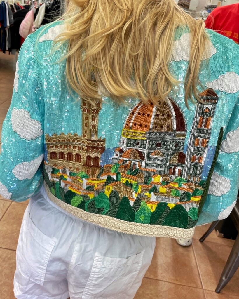 2024.06.11 AZ1 (1) The back of a Moschino sequined jacket with an image of a church and clouds